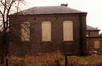 Magistrates' court with windows boarded up